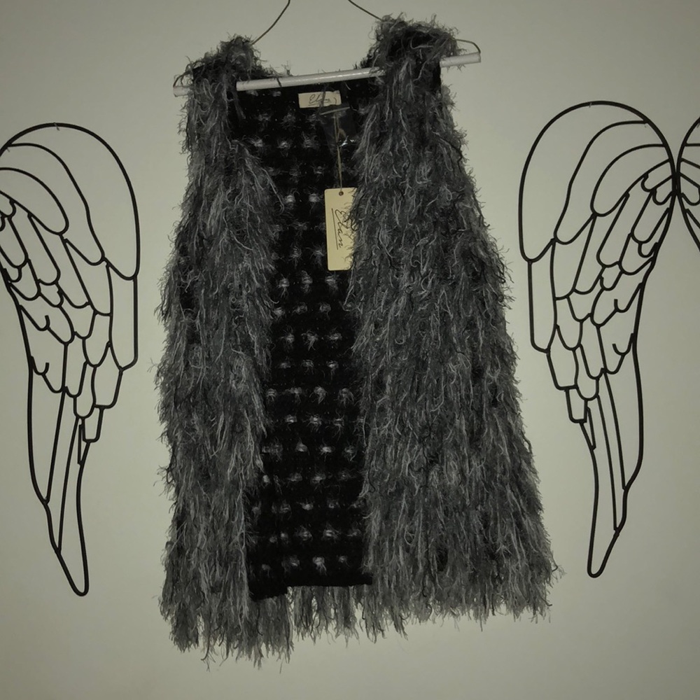 Stringy black and gray vest